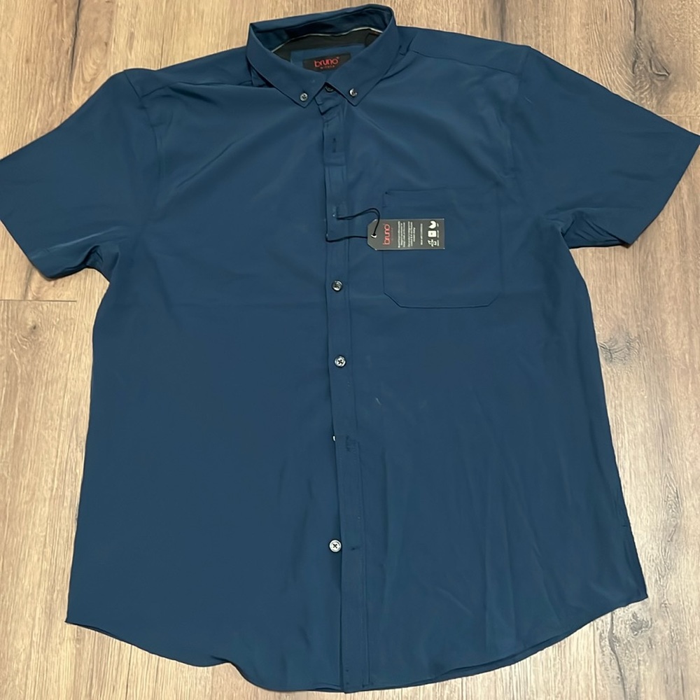 Navy blue men’s dress shirt . New with tags
